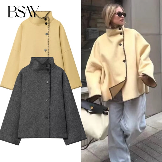 BSAY autumn new women's clothing 2025 new product French asymmetrical hem high collar single breasted long sleeved jacket
